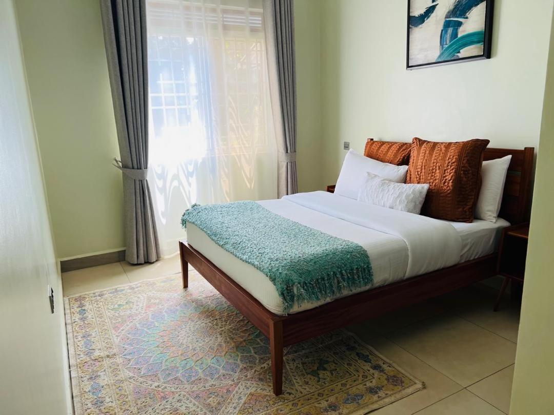 Alsander Homes Peach Bweyogerere Buitenkant foto