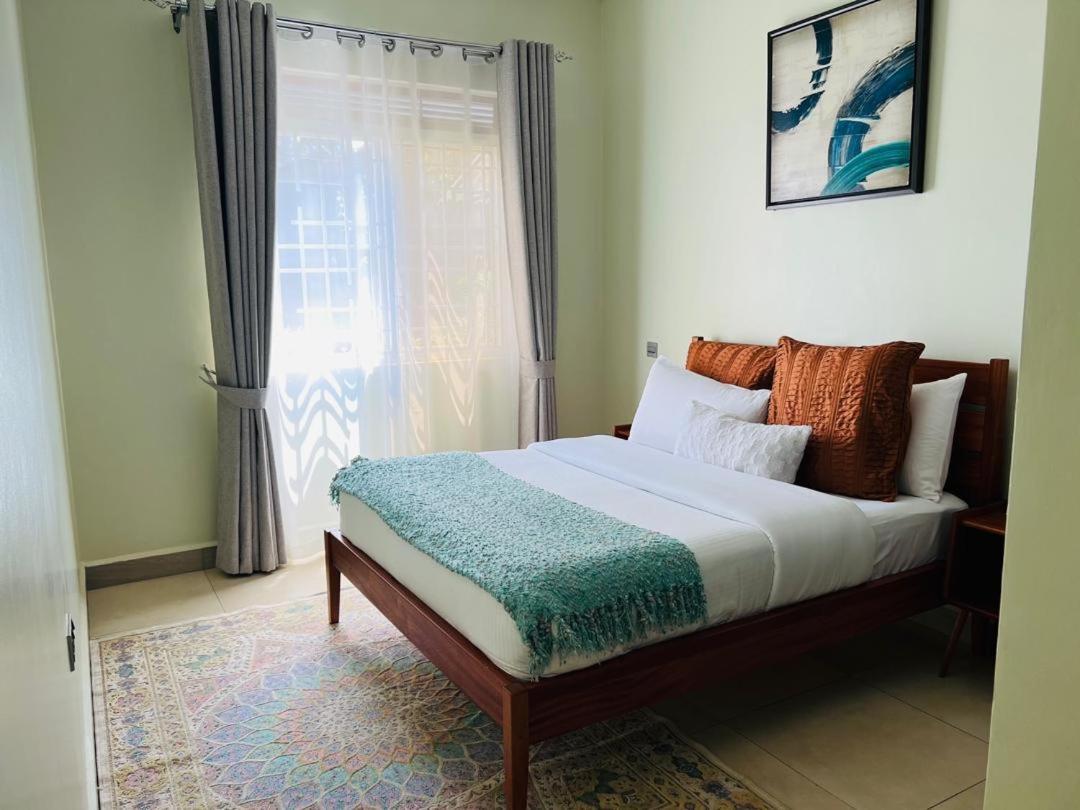 Alsander Homes Peach Bweyogerere Buitenkant foto